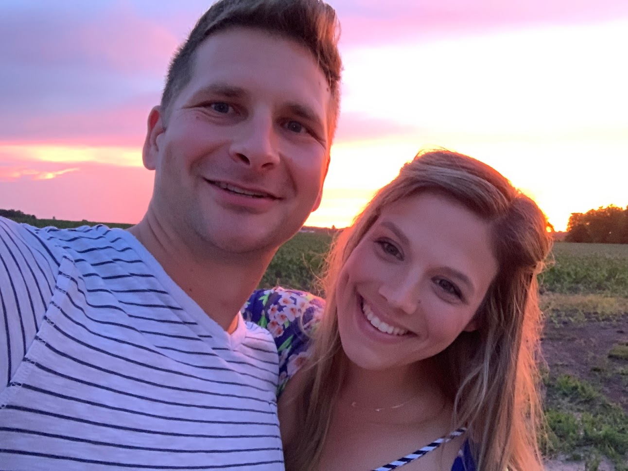 husband and wife sunset photo, stripe shirt