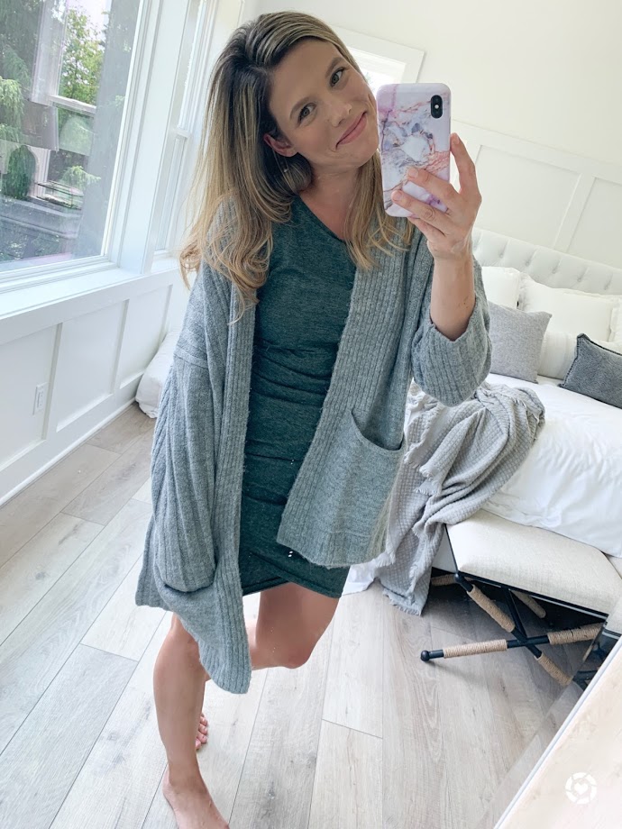 green dress with gray cardigan, selfie with phone